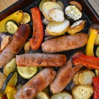 Close up of baked Simple Sausage Traybake