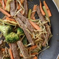 Cooking Beef Chow Mein in pan