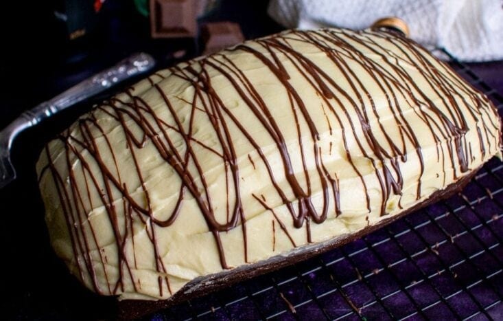 Close of of chocolate and Bailey's Loaf cake on wire rack