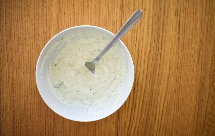 bowl of tzatziki with spoon