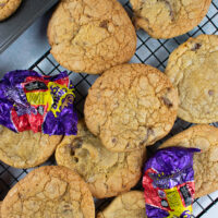 Creme Egg Cookies on wire rack. wrappers scattered.