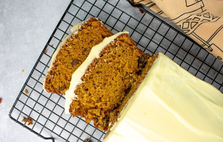 Slice Carrot Loaf Cake on Wire Rack.