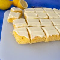 sliced lemon cake on chopping board.