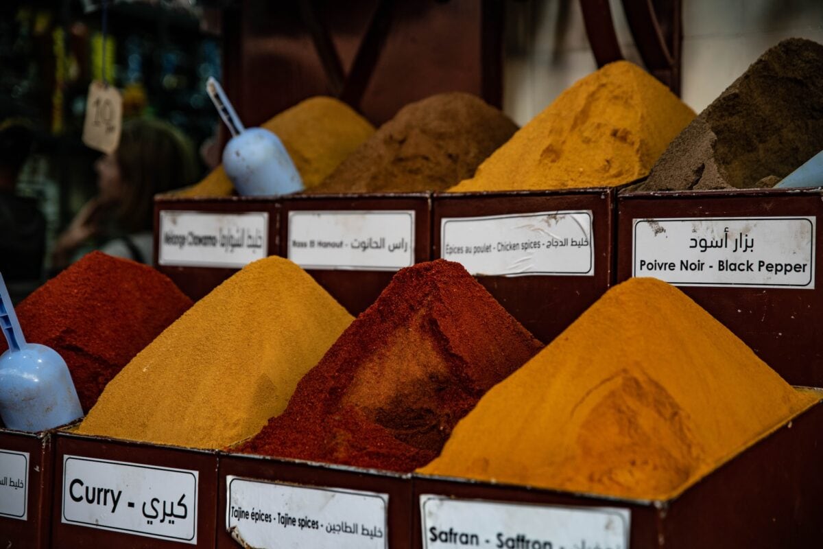 spices in boxes in a market.