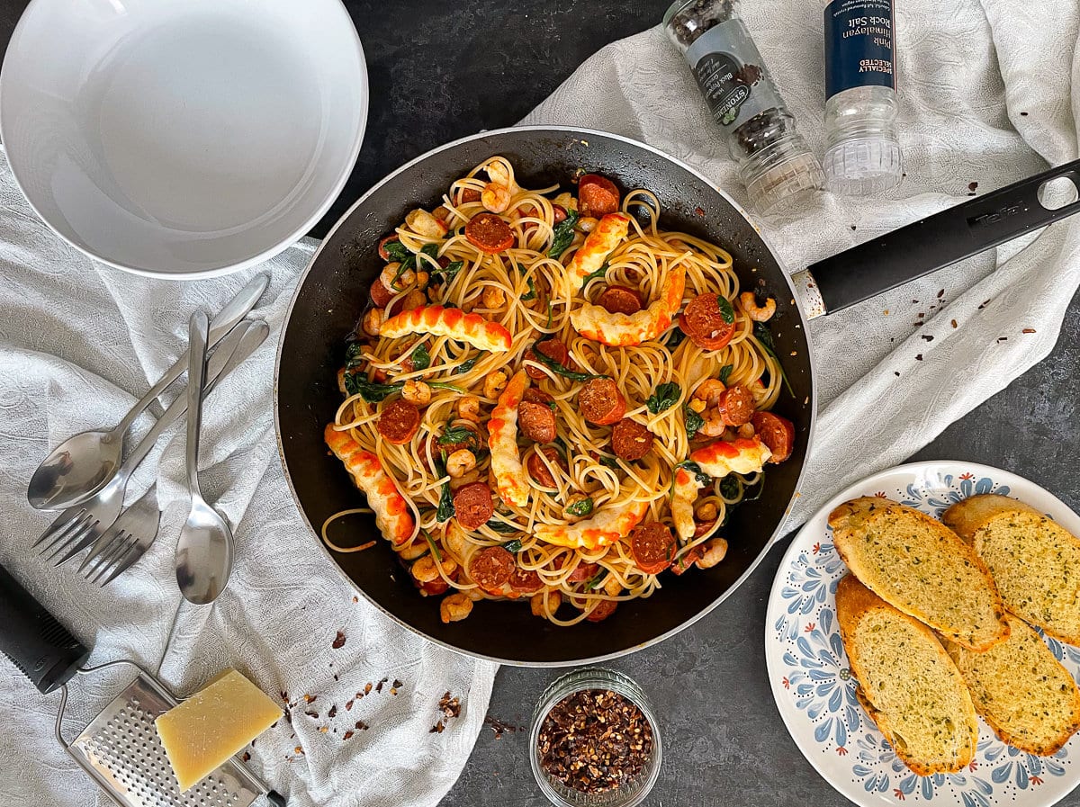 prawn and chorizo pasta in frying pan from above.