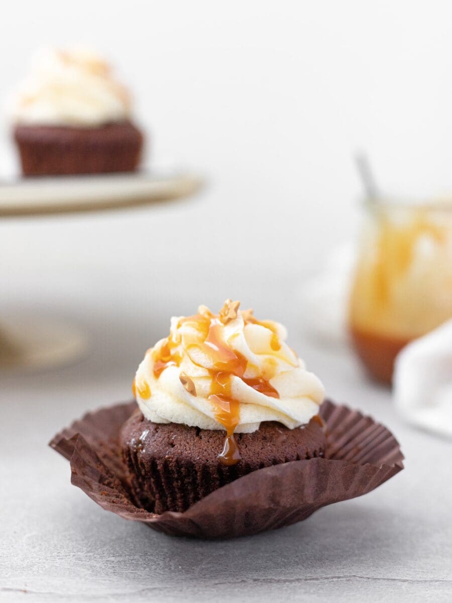 small cupcake with buttercream and caramel.