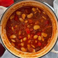 Chorizo and Buttercream Stew in cast-iron dish.