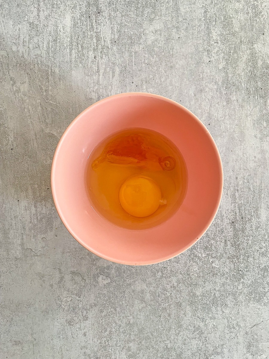 egg and syrup in pink bowl.