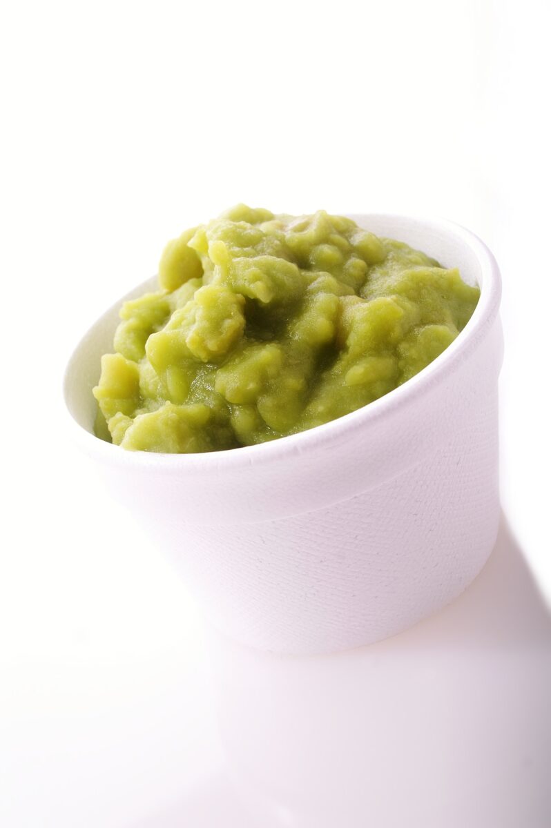 mushy peas in white ramekin.