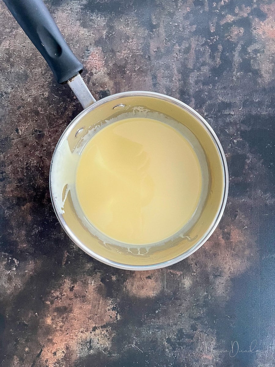 Melted butter in small saucepan.
