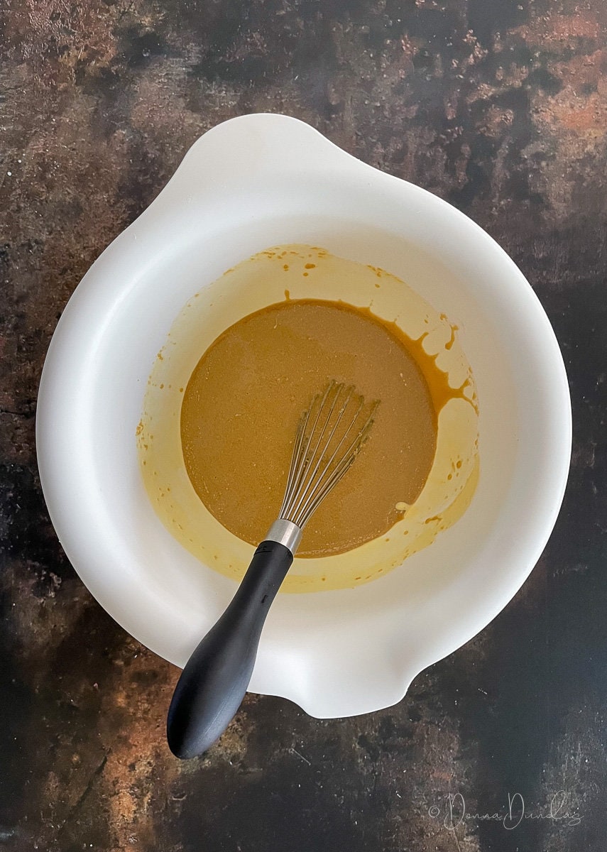 whisked brown sugar and butter in mixing bowl.
