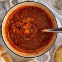 lamb stifado in cooking dish.