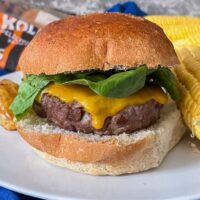 Juicy and flavourful burgers made in the air fryer! This easy recipe for air fryer burgers is perfect for busy weeknights and requires minimal effort. Get ready to sink your teeth into the most delicious burger you've ever tasted. Try it now!