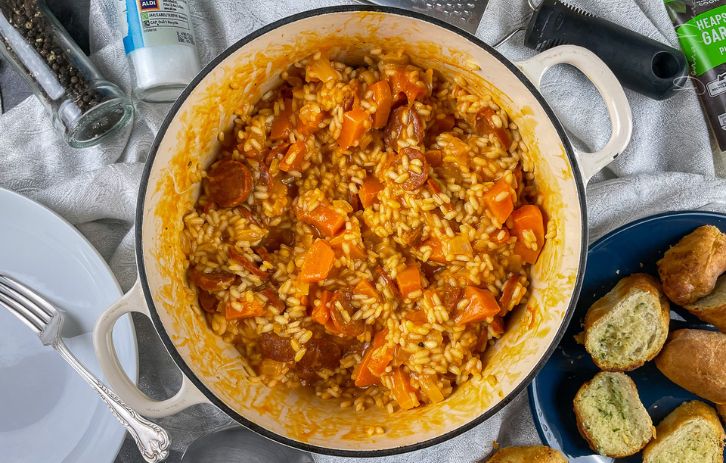 Butterenut squash and chorizo risotto in cast iron Dutch Oven dish.
