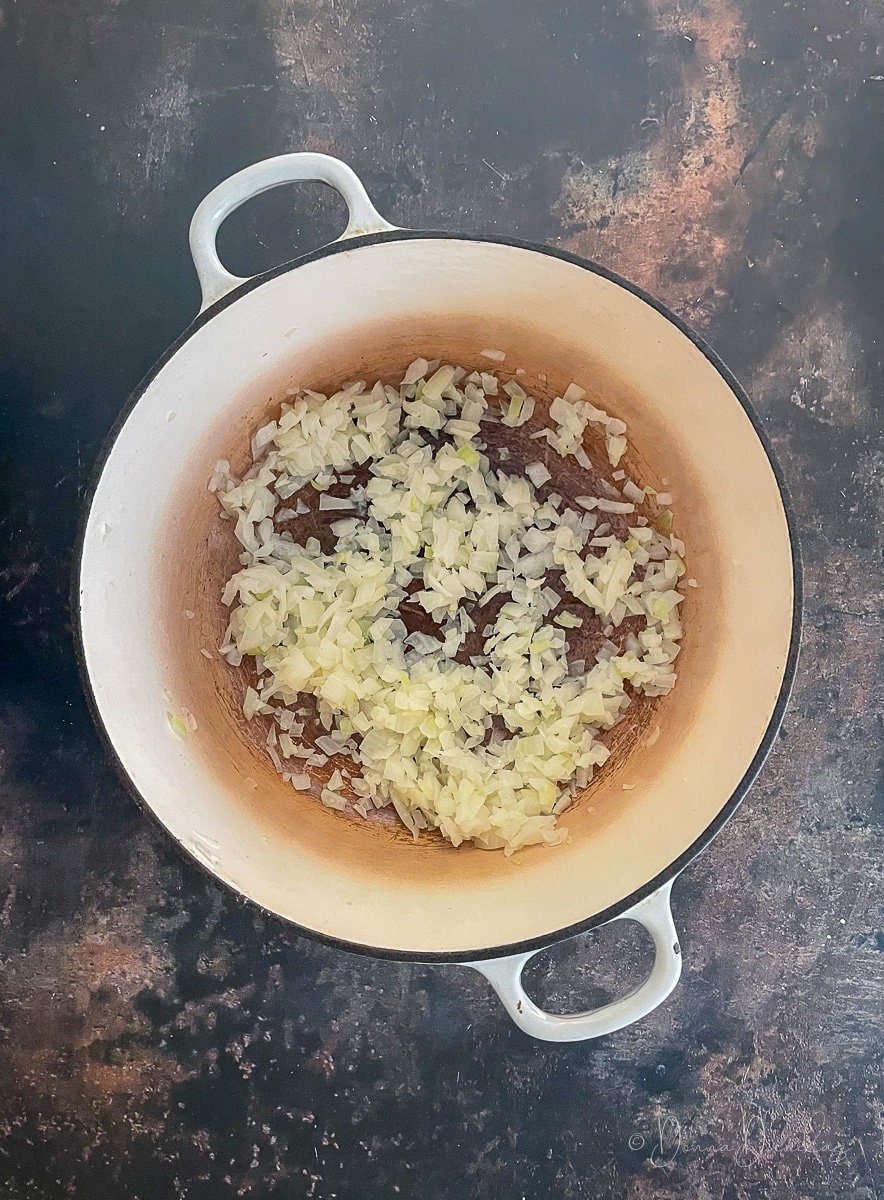 diced onion in cooking dish.