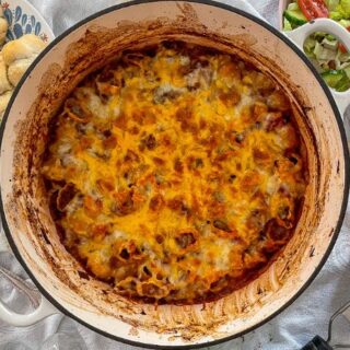 Bolognese pasta bake is the perfect midweek family dinner. Teaming two family favourites, and adding extra cheese for a delicious and filling meal.
