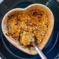 Air Fryer Apple Crumble for one, is the perfect easy single-serving pudding. Tangy apples with a sweet, crispy crumble that’s the perfect size for one!
