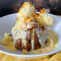 Air fryer cauliflower cheese is quick, easy and delicious! The perfect cheesy vegetable side dish that goes well with a variety of meals.