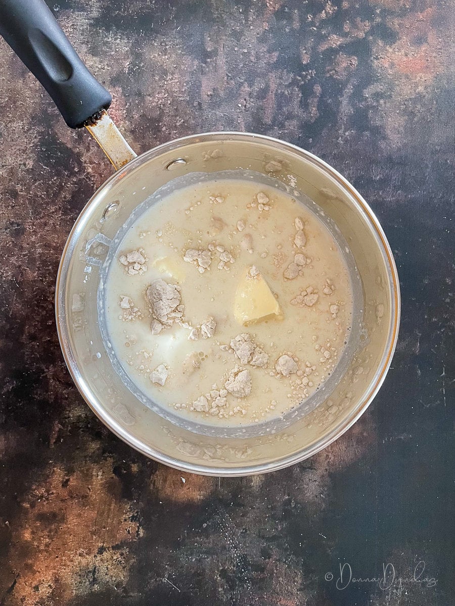 flour, butter and milk in pan.