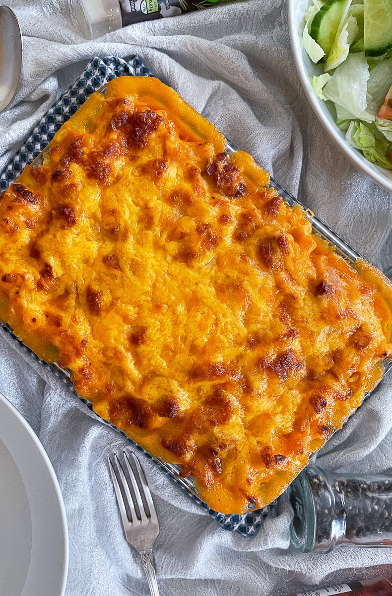 close up of chorizo mac and cheese in cooking dish.
