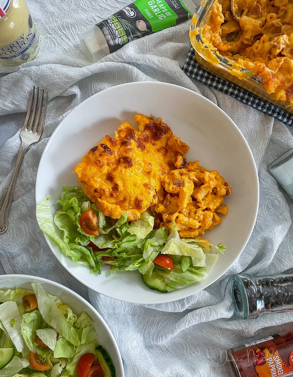 served mac and cheese with salad.