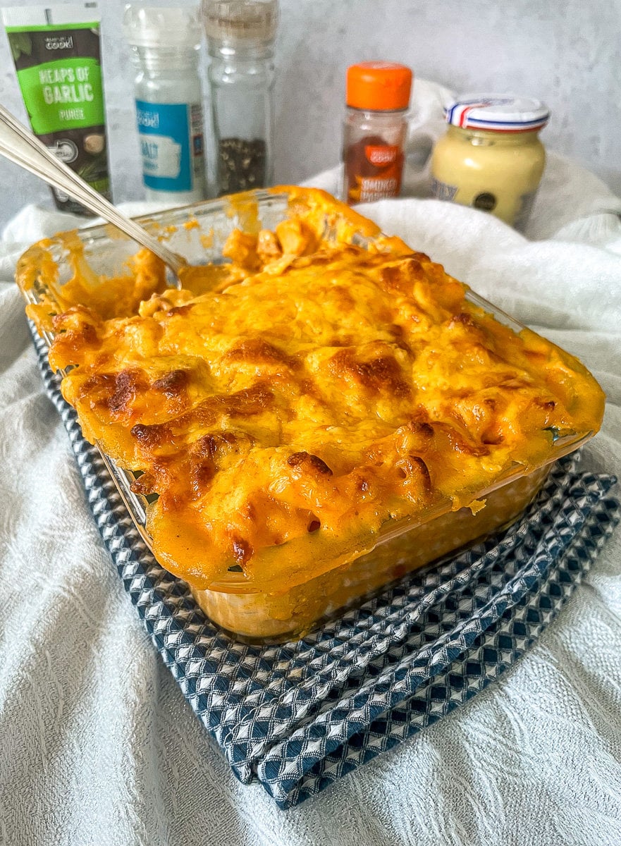 side view of chorizo mac and cheese in cooking dish.
