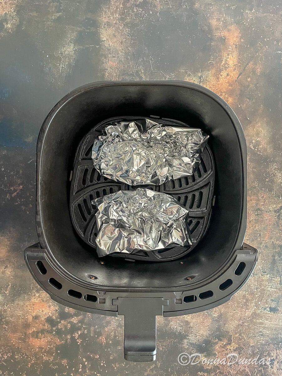 foil parcels in air fryer basket.
