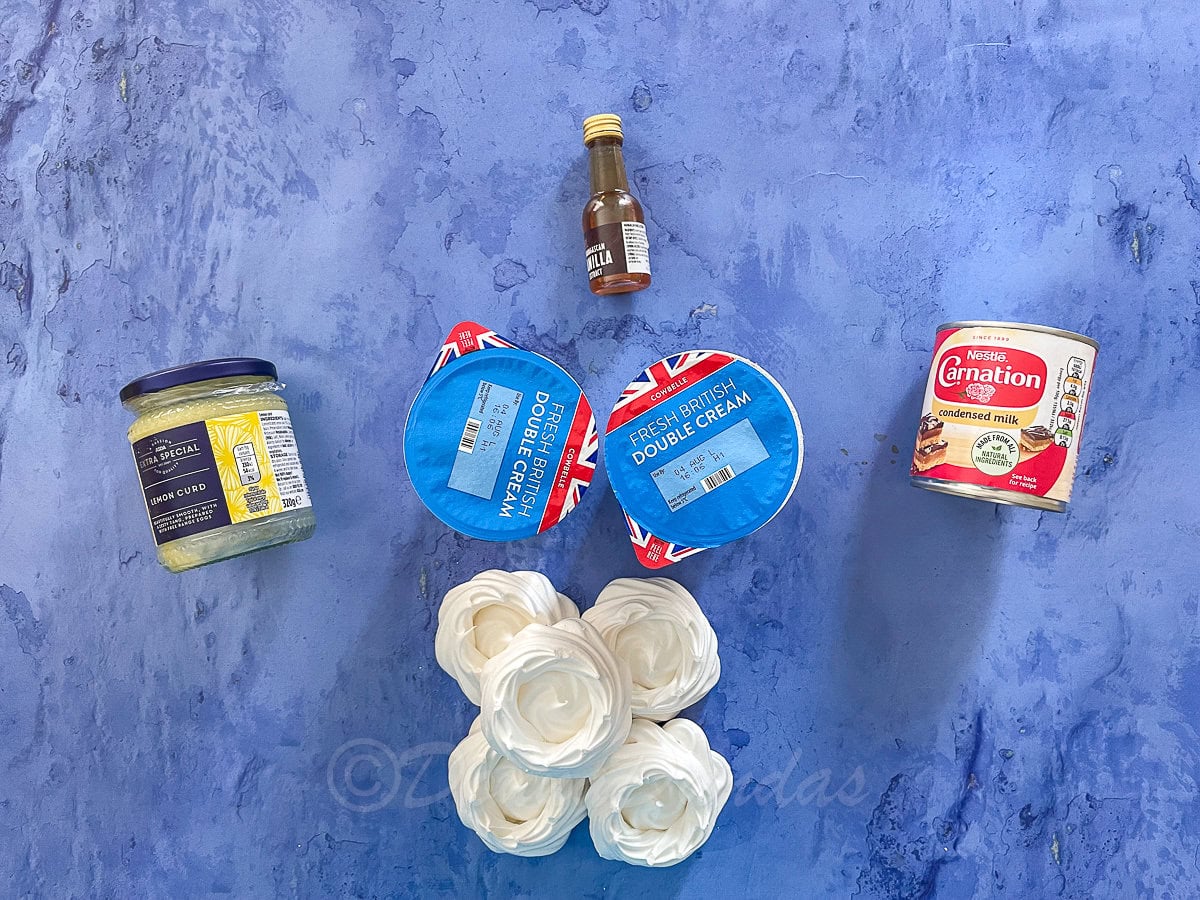 ingredients for no-churn lemon meringue ice cream on table.