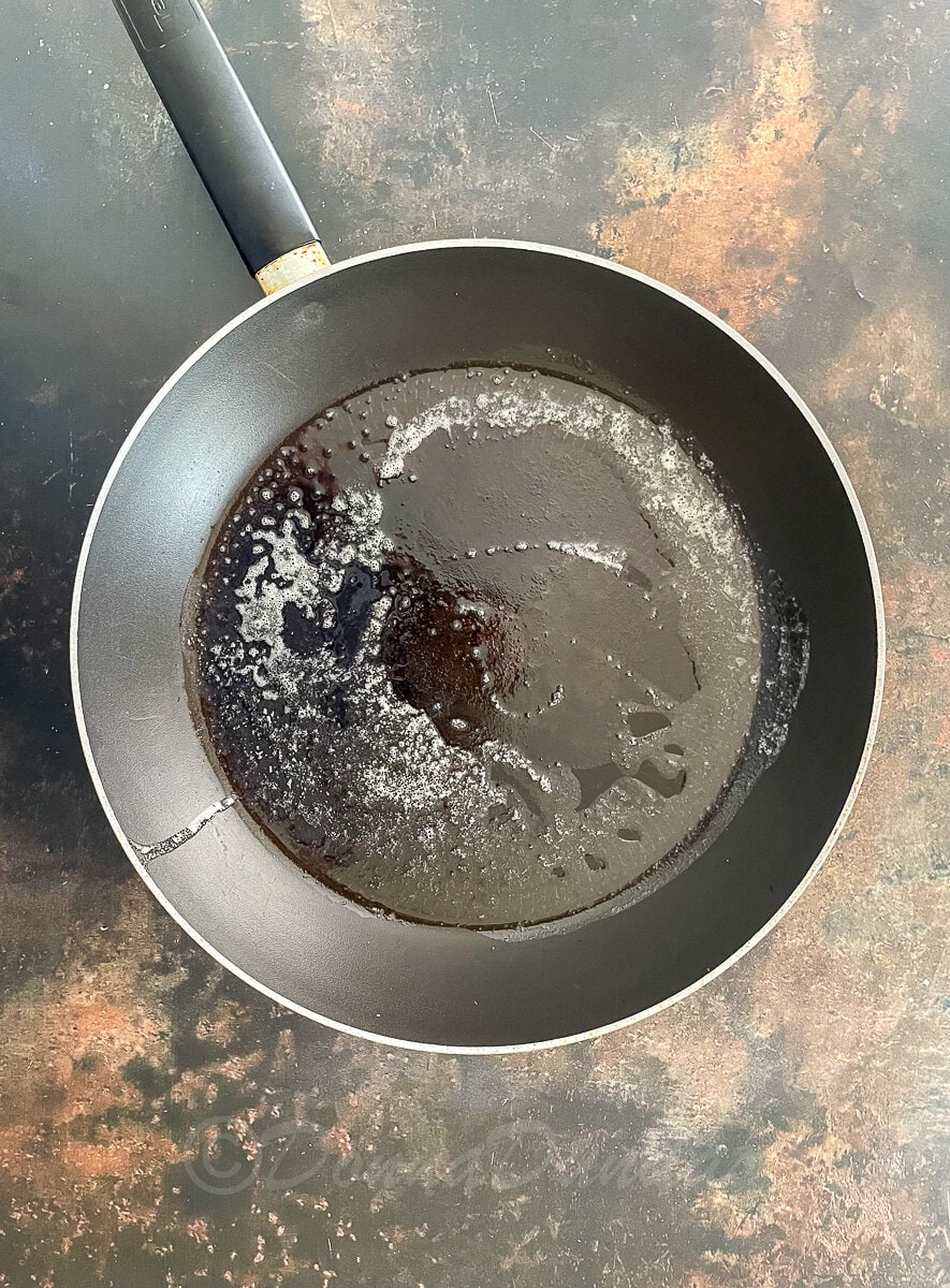 melted butter in frying pan.