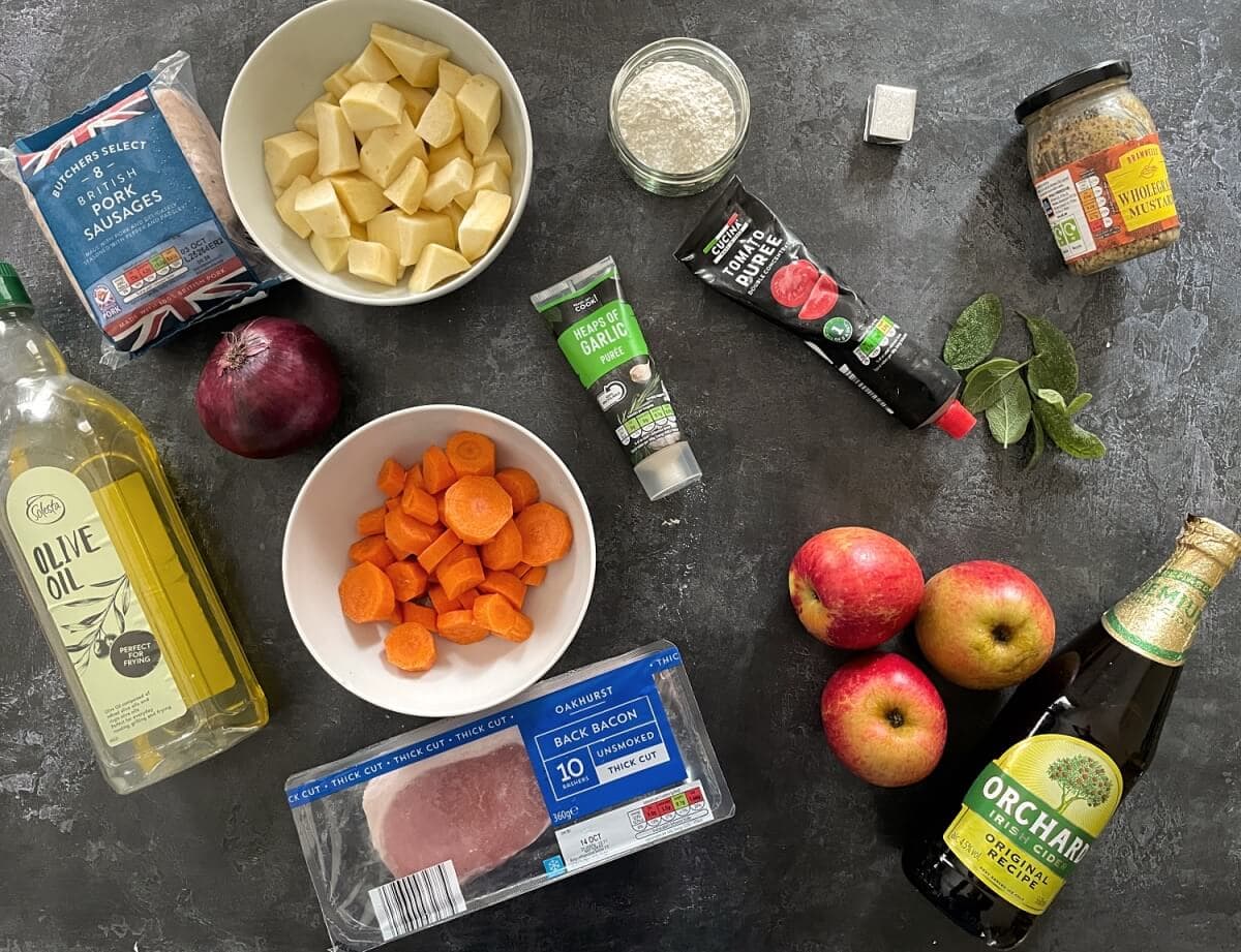 ingredients for sausage and cider casserole with apples.